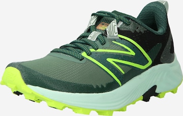 Chaussure de course new balance en vert : devant