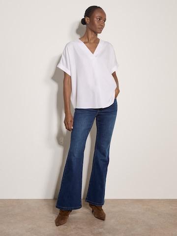 Chemisier ' ' Apricot en blanc