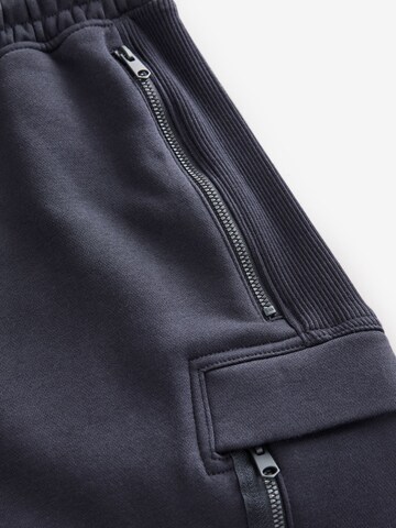 Next Tapered Gargohousut värissä sininen