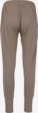 Athlecia Slim fit Workout Pants 'Sella' in Brown