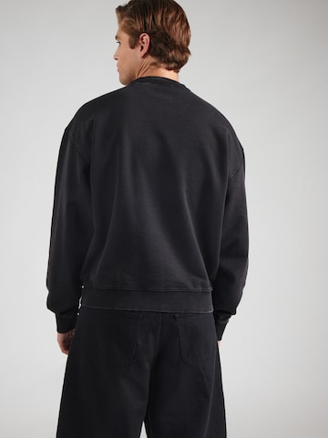 GUESS Originals Sweatshirt in Zwart