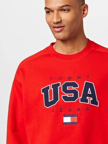 Tommy JeansSweater majica 'USA' - crvena boja