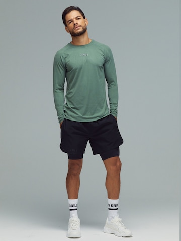Sweat de sport 'XFUNCTION Longsleeve Tee' DRILLS Apparel en vert