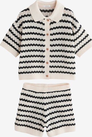 Next Set in Black: front