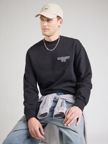 Carhartt WIP Свитшот 'Alumni' в Черный: спереди