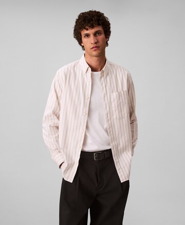 Coupe regular Chemise Calvin Klein Jeans en beige : devant