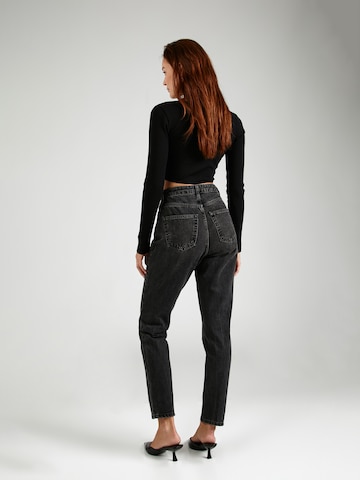 TOPSHOP Tapered Jeans in Black