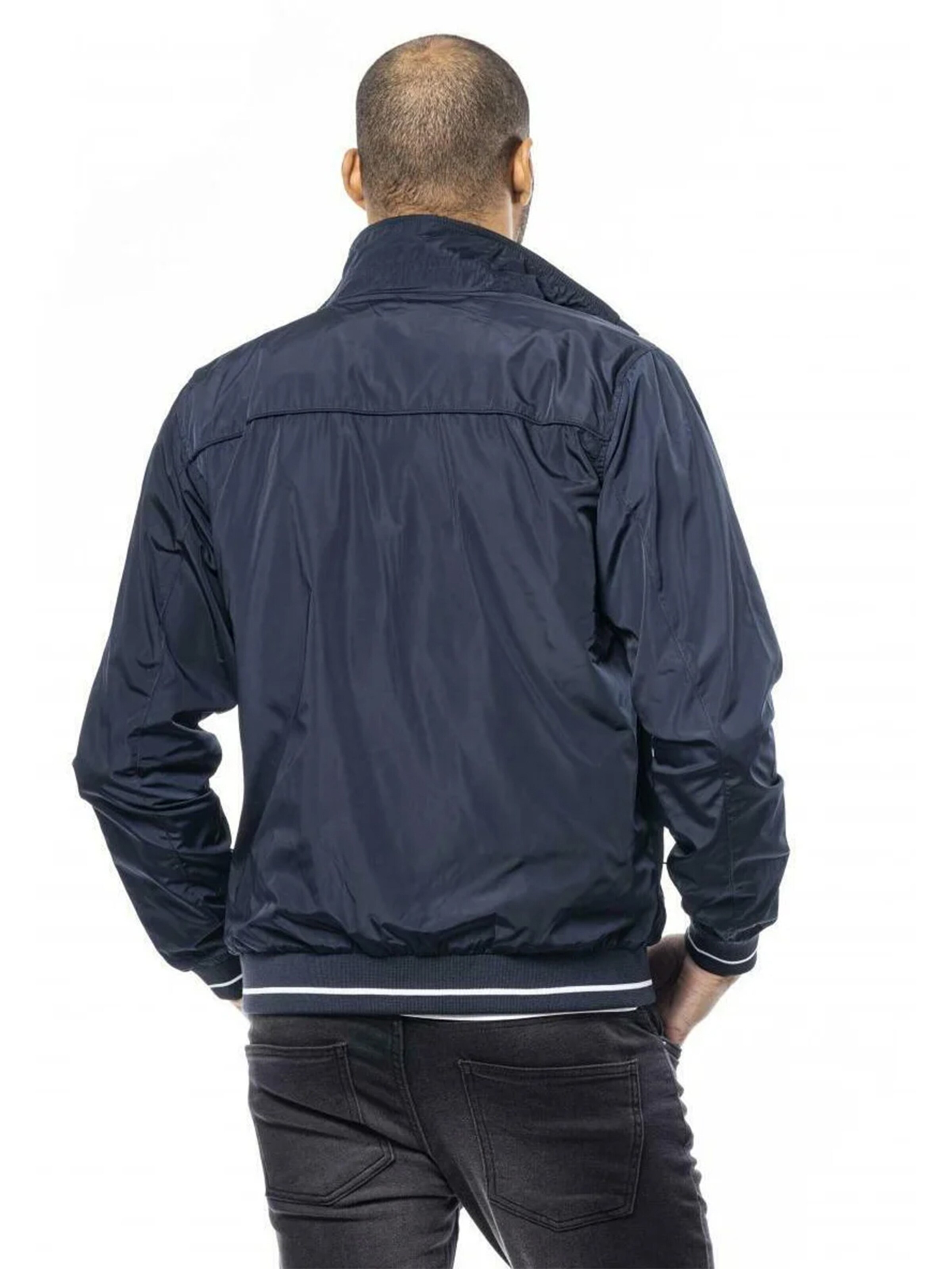 U.S. POLO ASSN. Přechodná bunda 'UMCOLE' – modrá