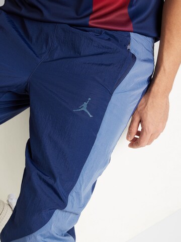 Jordan Zúžený Kalhoty 'JAM WARM UP' – modrá
