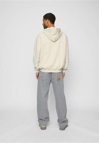 Veste de survêtement 'Essential' Karl Kani en beige