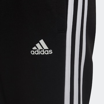 ADIDAS SPORTSWEAR Zwężany krój Spodnie sportowe 'Essential' w kolorze czarny