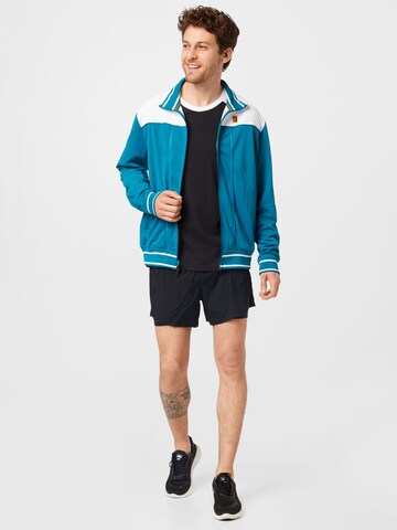 Veste de sport NIKE en bleu