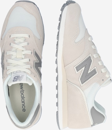 Sneaker bassa '373' di new balance in beige