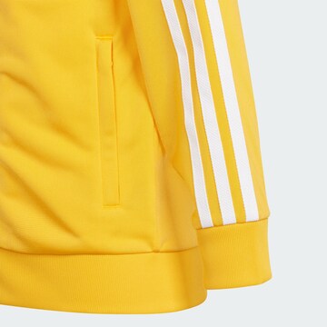 ADIDAS ORIGINALS Sweatsuit 'Adicolor Sst' in Yellow