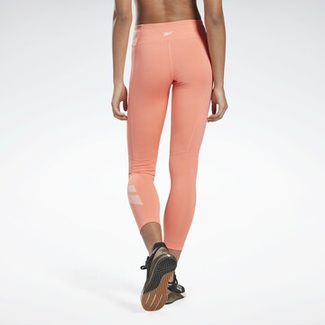 Reebok Skinny Sportovní kalhoty – oranžová