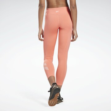 Reebok Skinny Športne hlače | oranžna barva