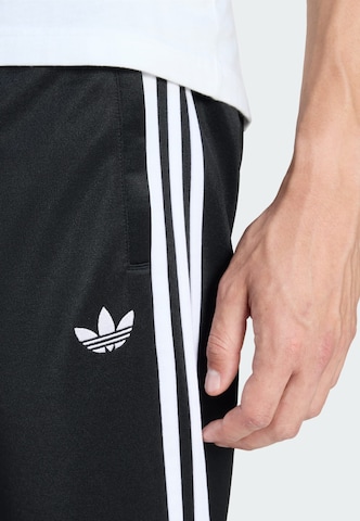 ADIDAS ORIGINALS - regular Pantalón en negro