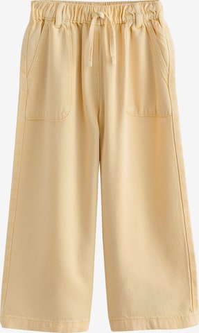 Next Džíny – žlutá: přední strana