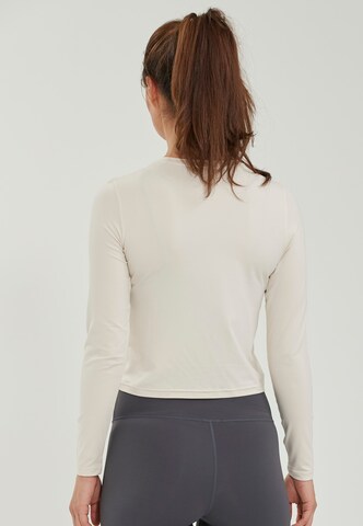 Athlecia Performance Shirt in Beige