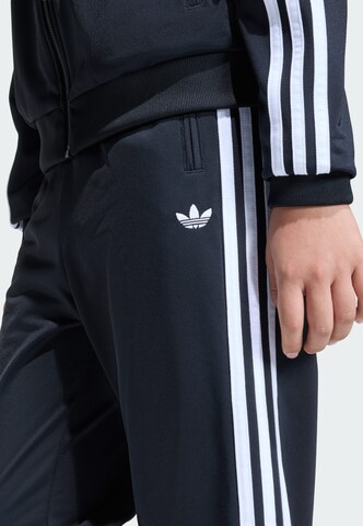 ADIDAS ORIGINALS Regular Broek 'Firebird' in Zwart