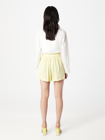 River Island Loosefit Shorts 'CITY' in Gelb