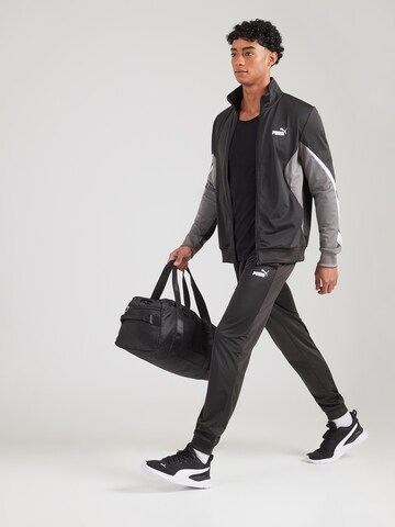 PUMA Облекло за трениране 'ESS' в черно