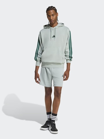 ADIDAS SPORTSWEAR regular Παντελόνι φόρμας 'Essentials' σε πράσινο: μπροστά