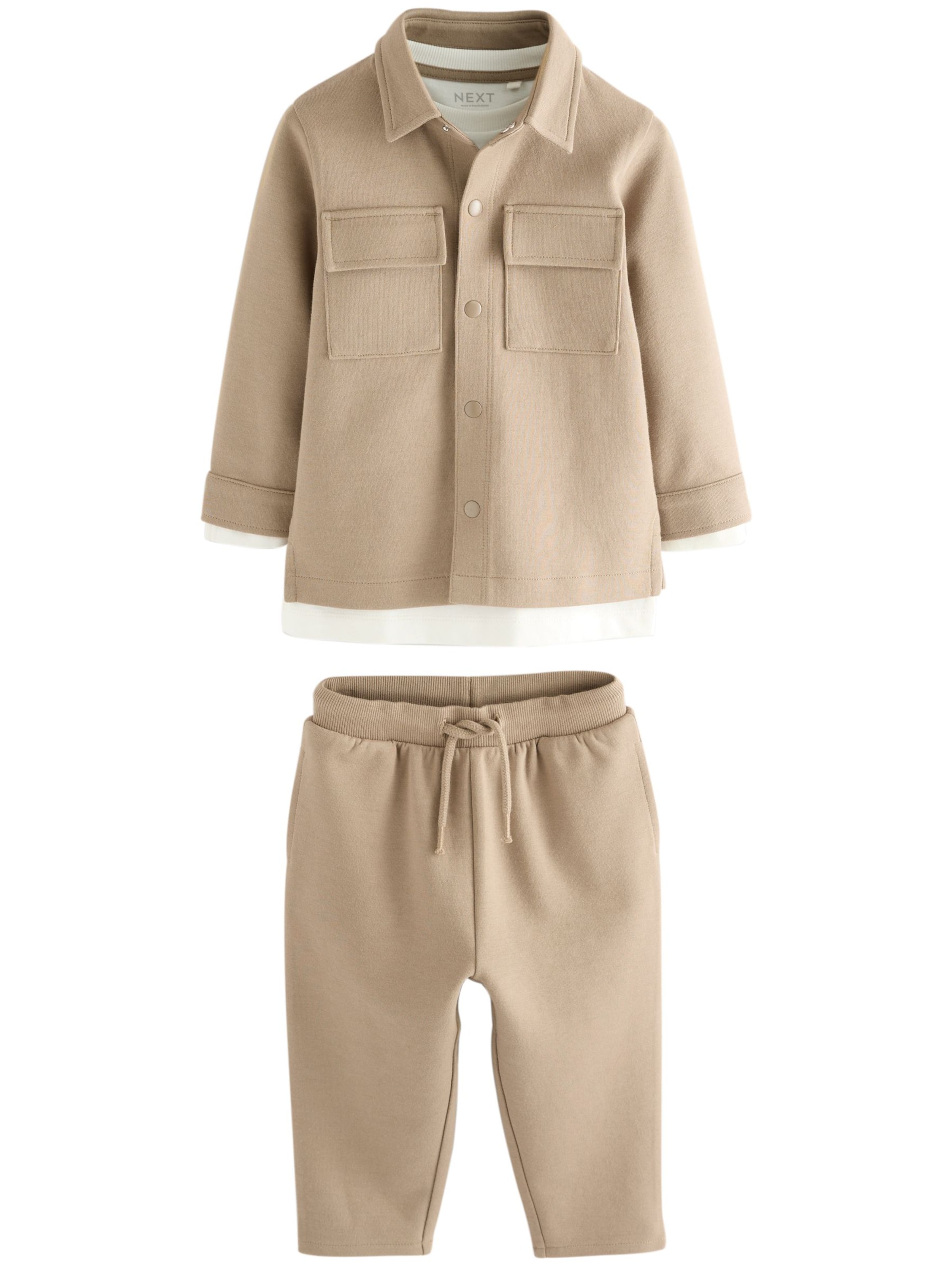 Next Set i brun: framsida