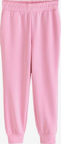 NextTapered Hlače - roza boja: prednji dio
