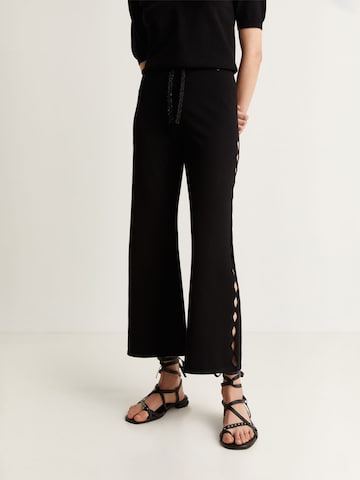 Scalpers Flared Trousers in Black