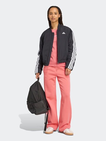 ADIDAS SPORTSWEAR - Pierna ancha Pantalón deportivo en naranja: frente