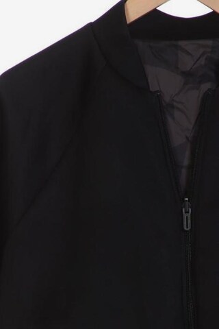 UNDER ARMOUR Jacket & Coat in M in Black