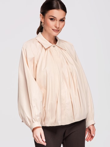 Ombre Blus i beige: framsida