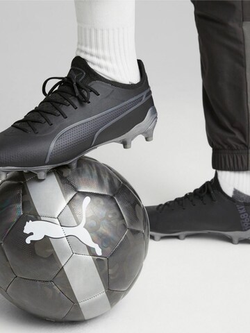 PUMA Soccer shoe 'Puma King Ultimate FG AG' in Black