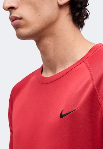 NIKE Funkční tričko 'FLEX' – červená