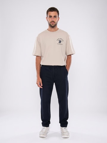 Thinking MU Baggy Broek 'STRAIGHT PANTS NAVY TRAVEL LIGHT' in Blauw: voorkant