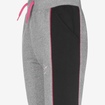 Nike Sportswear Tapered Trousers in Grey