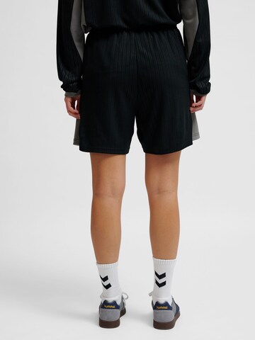 Loosefit Pantalon de sport Hummel en noir