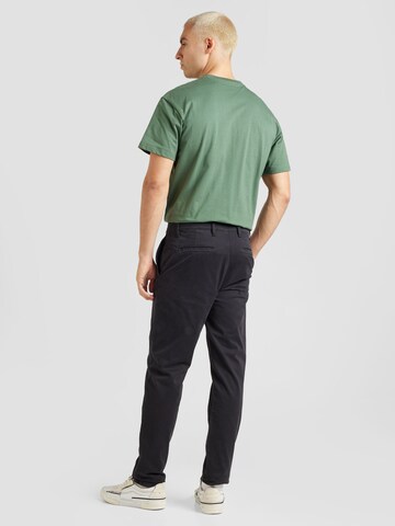 Tapered Pantaloni eleganți de la BOSS pe negru