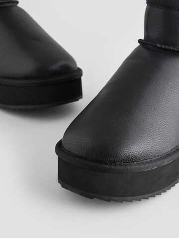 Next Boot i svart