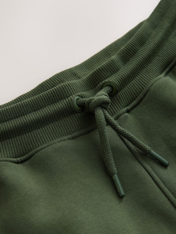 Tapered Pantaloni di Next in verde