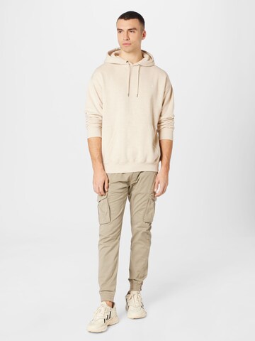 Tapered Pantaloni cargo di ALPHA INDUSTRIES in beige