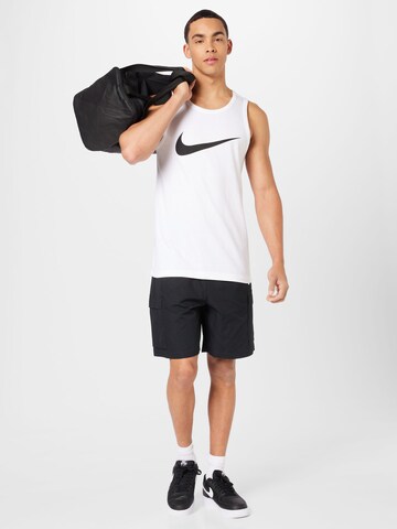 Nike Sportswear Ohlapna forma Kargo hlače | črna barva