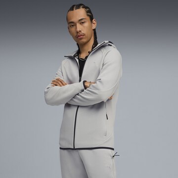 PUMA Sportsweatvest 'Evostripe' in Grijs: voorkant