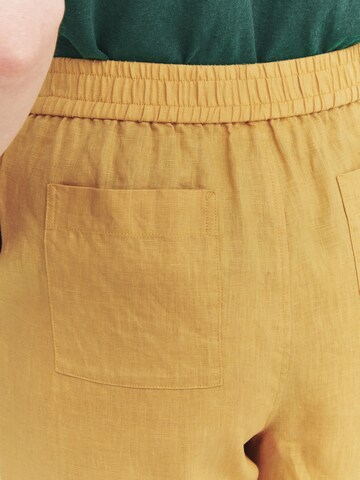 Bootcut Pantaloni con pieghe 'Smarta' di TATUUM in giallo