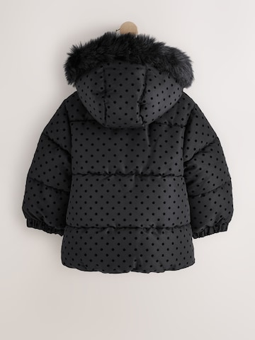 Next Mantel in Schwarz
