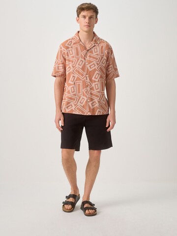 Next - Ajuste regular Camisa en naranja