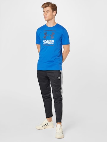 T-Shirt fonctionnel 'Foundation' UNDER ARMOUR en bleu