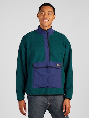 LEVI'S ® Sweter 'Polar Fleece Mock Neck Sweatshirt' w kolorze zielony: przód