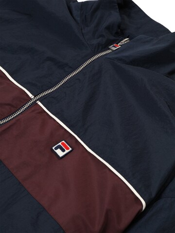 Giacca di felpa 'FERRARA oversized blocked woven track jacket' di FILA in blu